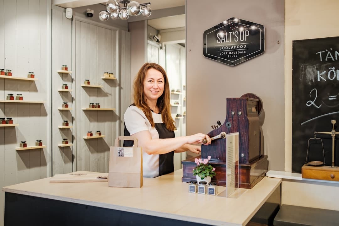 Small business owner at their shop counter